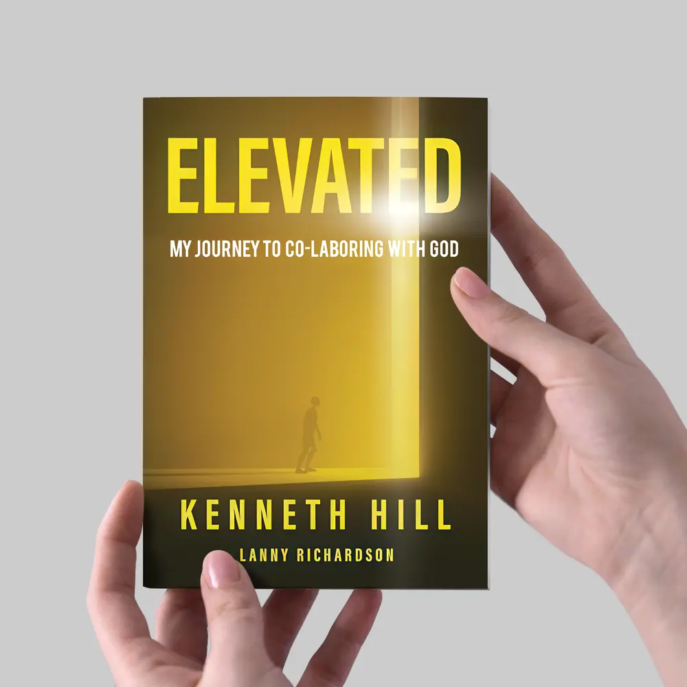 ELEVATED book being held  in  hand by reader